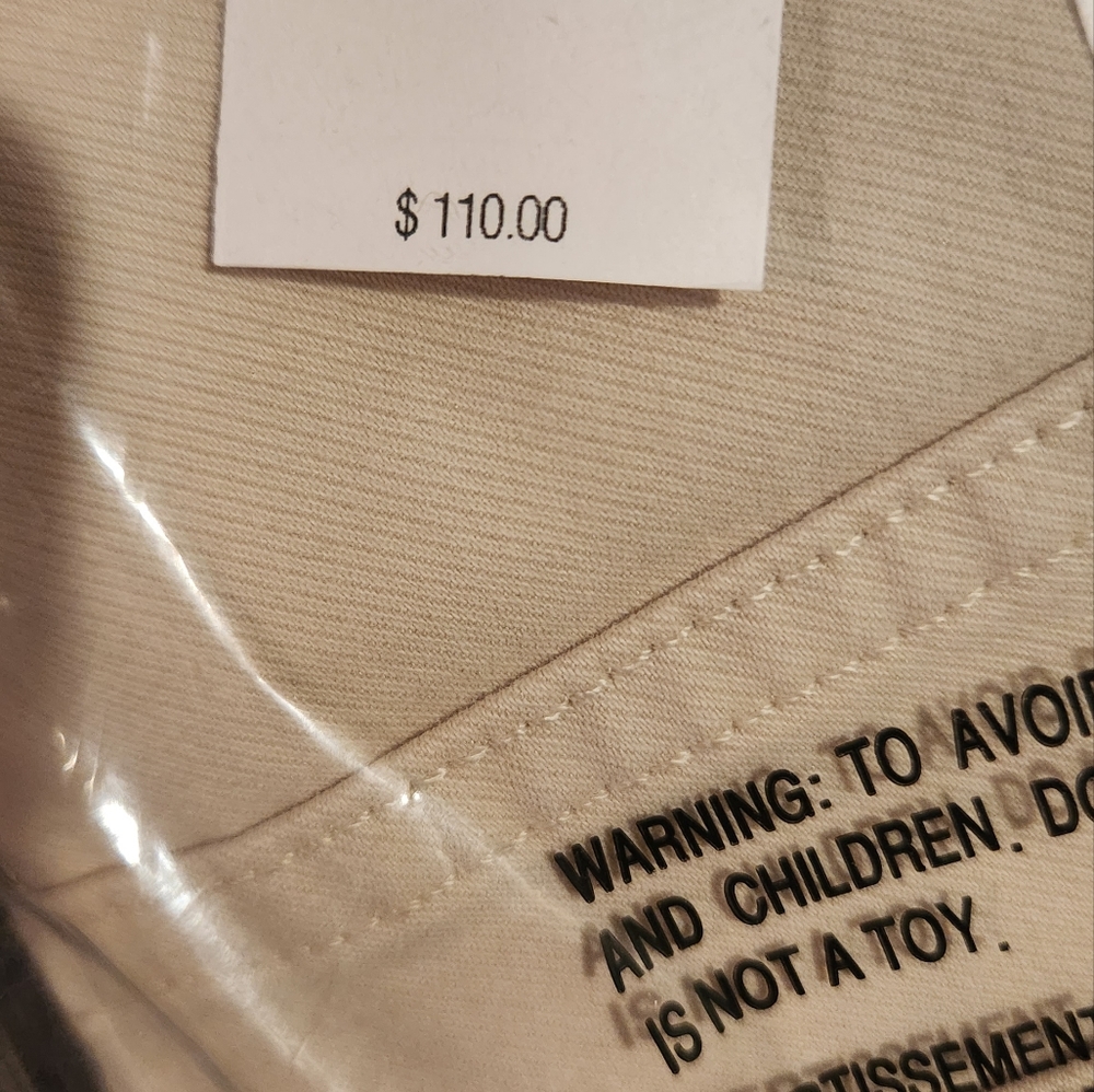 Mens traveler pants.  New.  Nwver opened.  70$